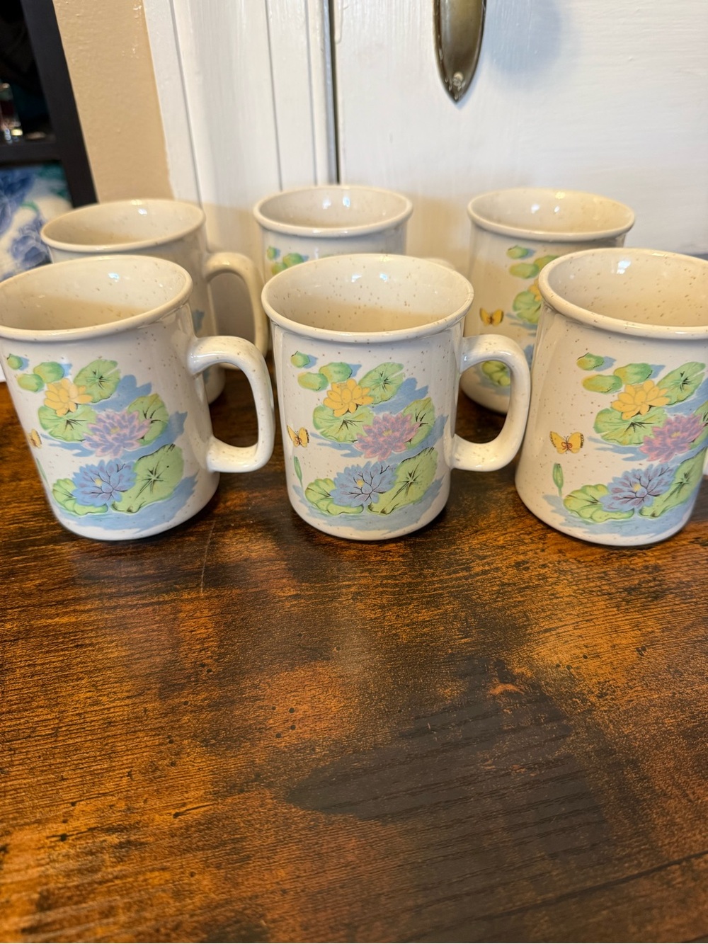 vintage ceramic stoneware mug with a colorful wraparound water lily pond design